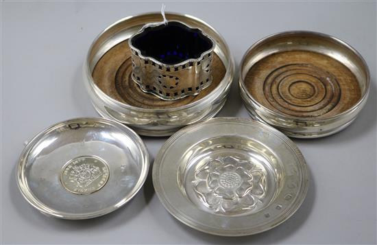 Two silver ashtrays, two bottle coasters and a salt.